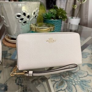 Coach Cream Wristlet with Gold Accents